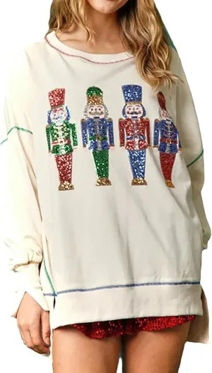 KMBANGI Women Christmas Nutcracker Sweatshirt Holiday Funny Graphic Pullover Top Oversized Crewneck Long Sleeve Shirts